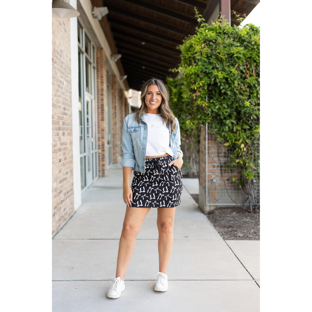 Millie White Bow Jogger Skirt | Pocketed Athleisure Mini Skirt